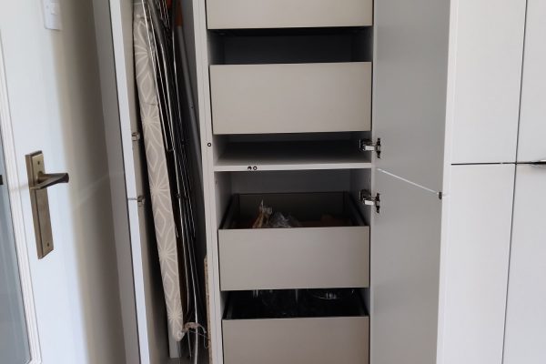 Custom storage cupboard in German kitchen, Harrow
