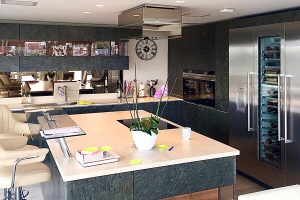 Stone penthouse kitchen in Putney with kitchen island by CasaLife Kitchens